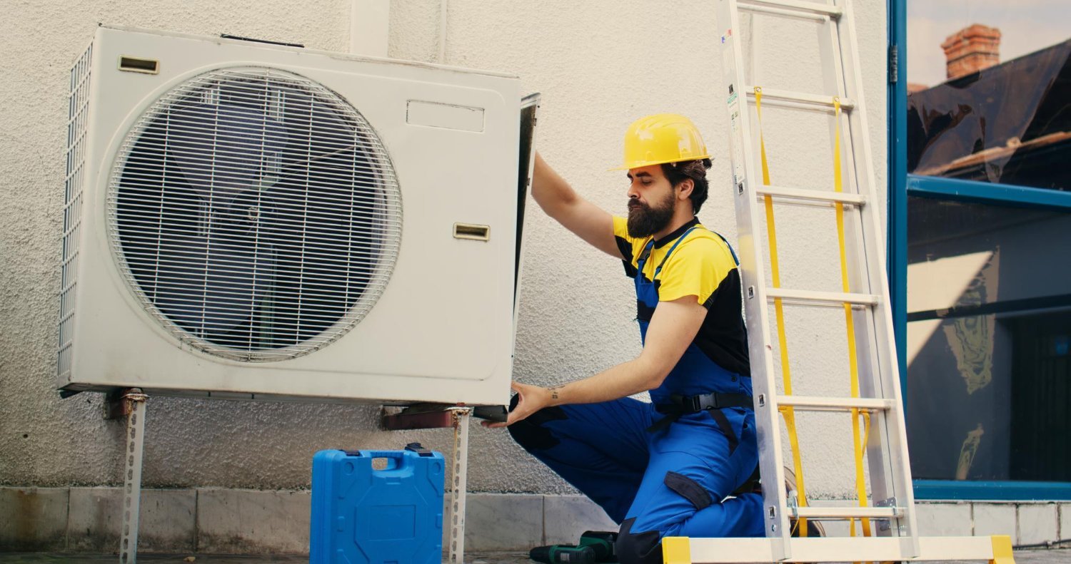 HVAC technician performing AC Installation in Panama City Beach FL