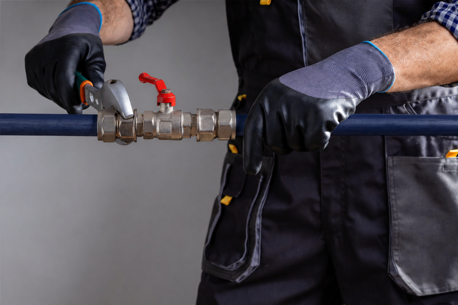 Technician repairing gas pipeline in the house