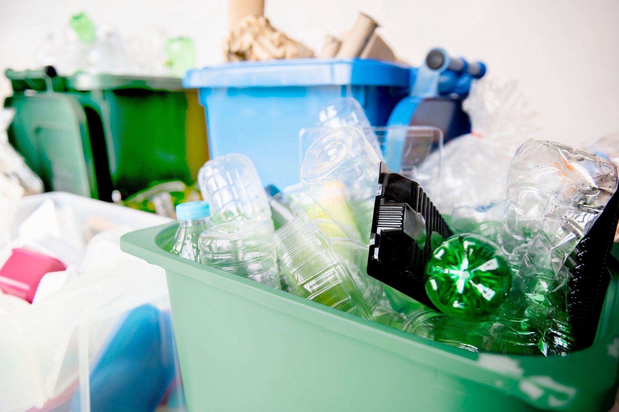 Used plastic bottles in recycling bins